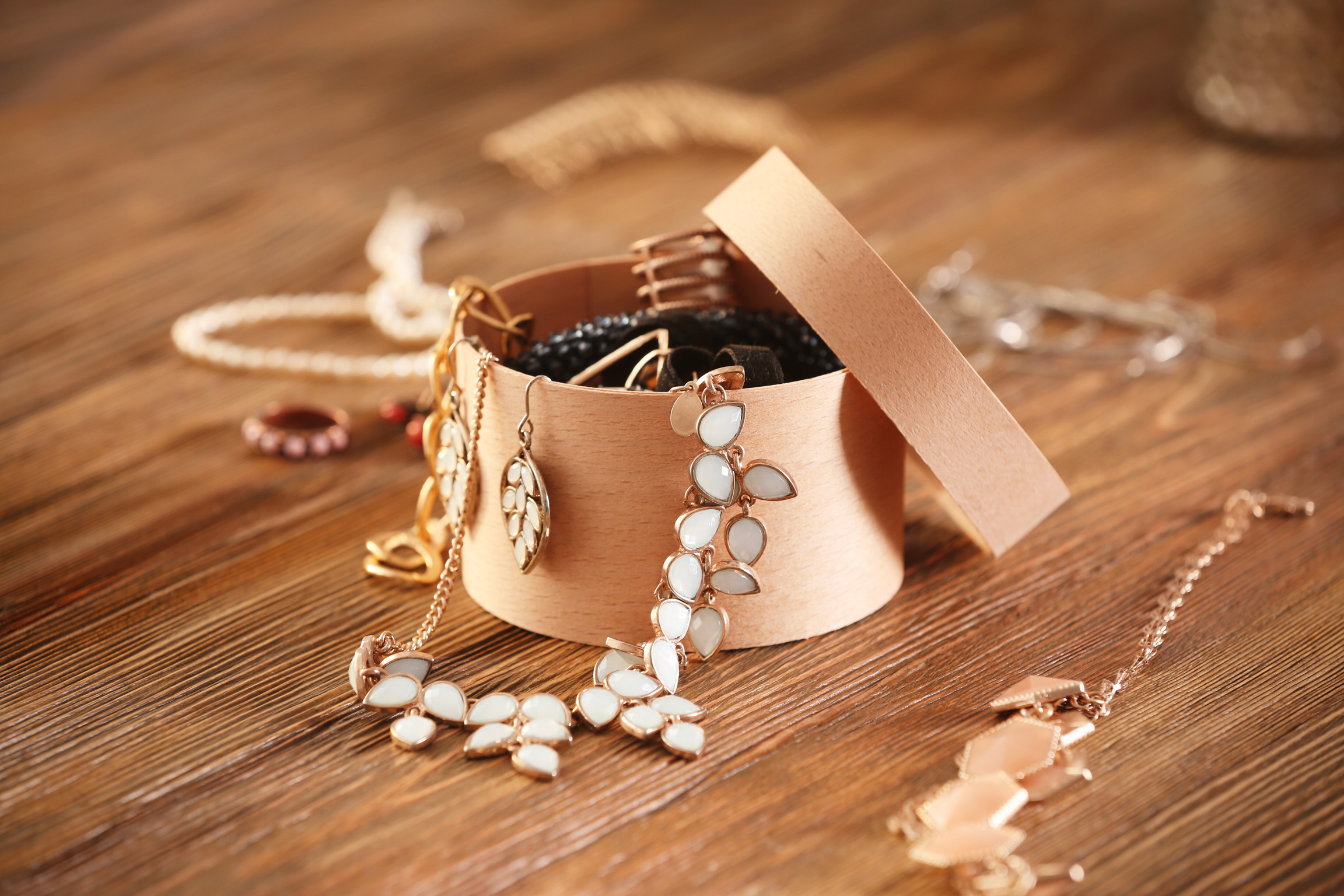 Collection of Bijouterie on Wooden Background